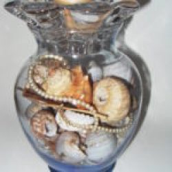 Centerpiece: Votive/vase with sea shells and pearls